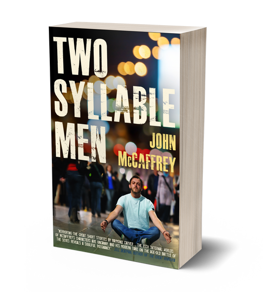 Two Syllable Men Paperback by John McCaffrey